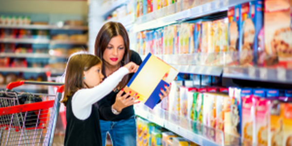 mom and daughter in grocery isle